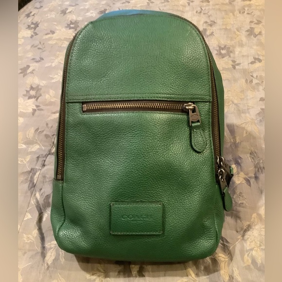 Coach Leather Sling Backpack in Green Pebbled Leather. - Picture 1 of 16